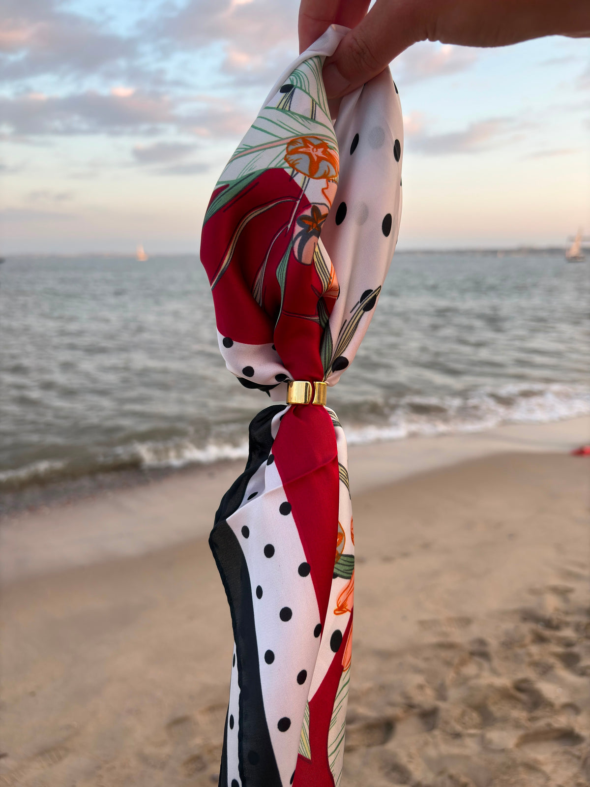 Cerise Scarf held at the beach